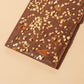Close-up of Salted Caramel & Buckwheat - Milk Chocolate Bar - 42% Cacao