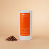 Honest Chocolat spiced drinking chocolate canister on a beige background