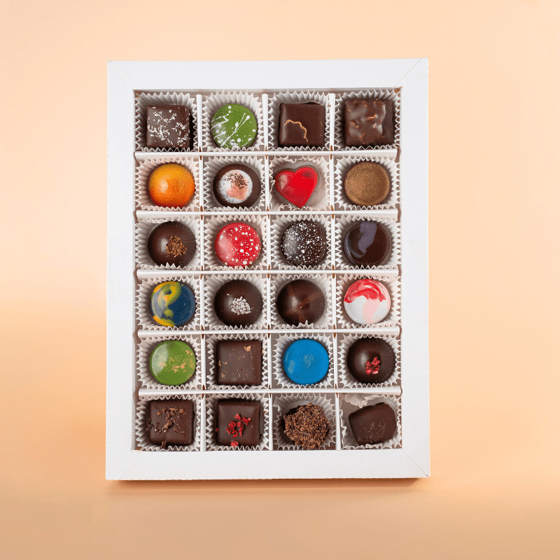 Close-up of Honest Chocolat 24 Days of Christmas Advent Calendar chocolates, handcrafted vegan treats NZ