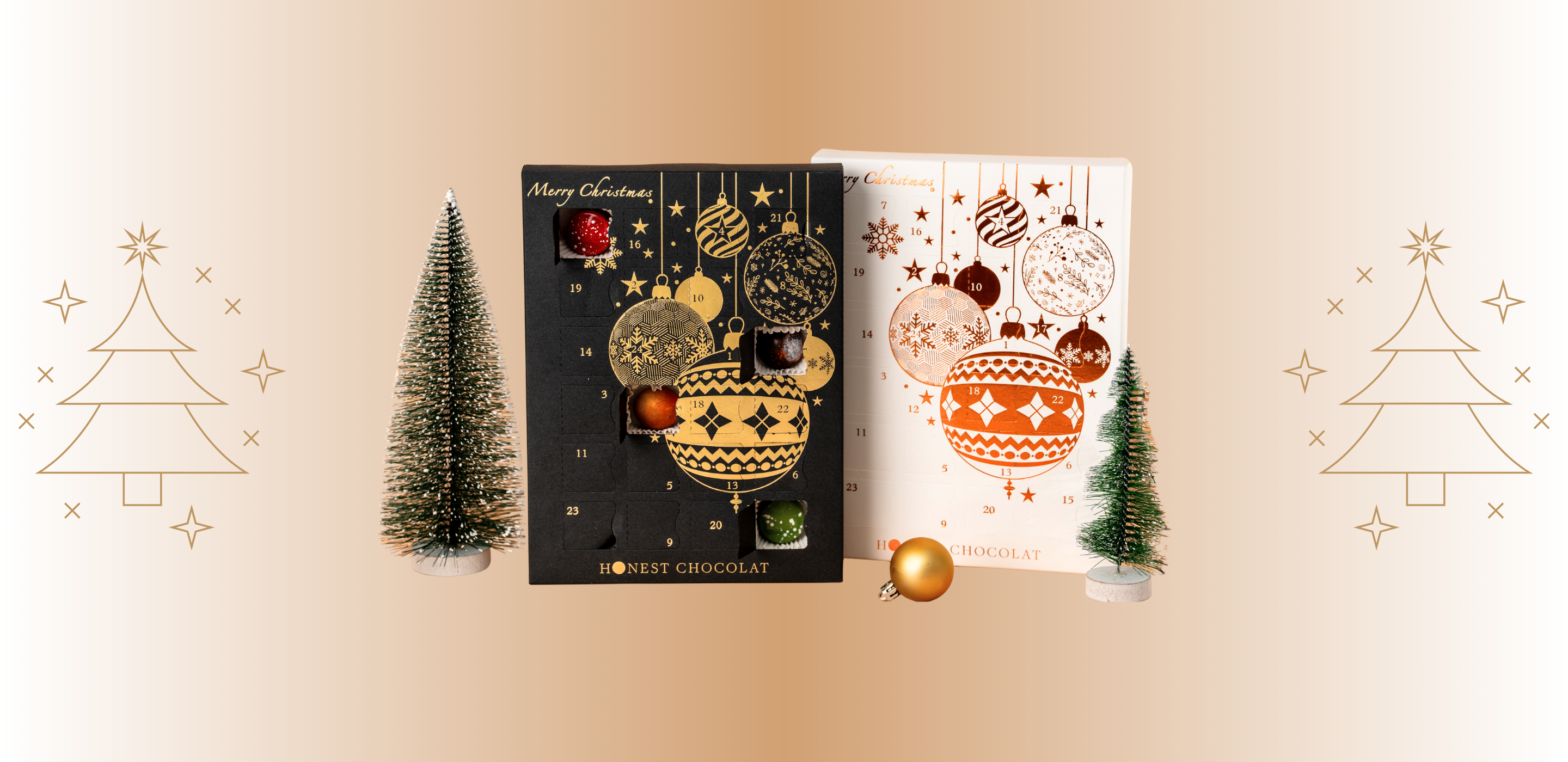 Luxury Christmas Chocolate Advent Calendars by Honest Chocolat in black & gold and white & bronze designs, displayed with festive decorative trees and ornaments, handcrafted in New Zealand.