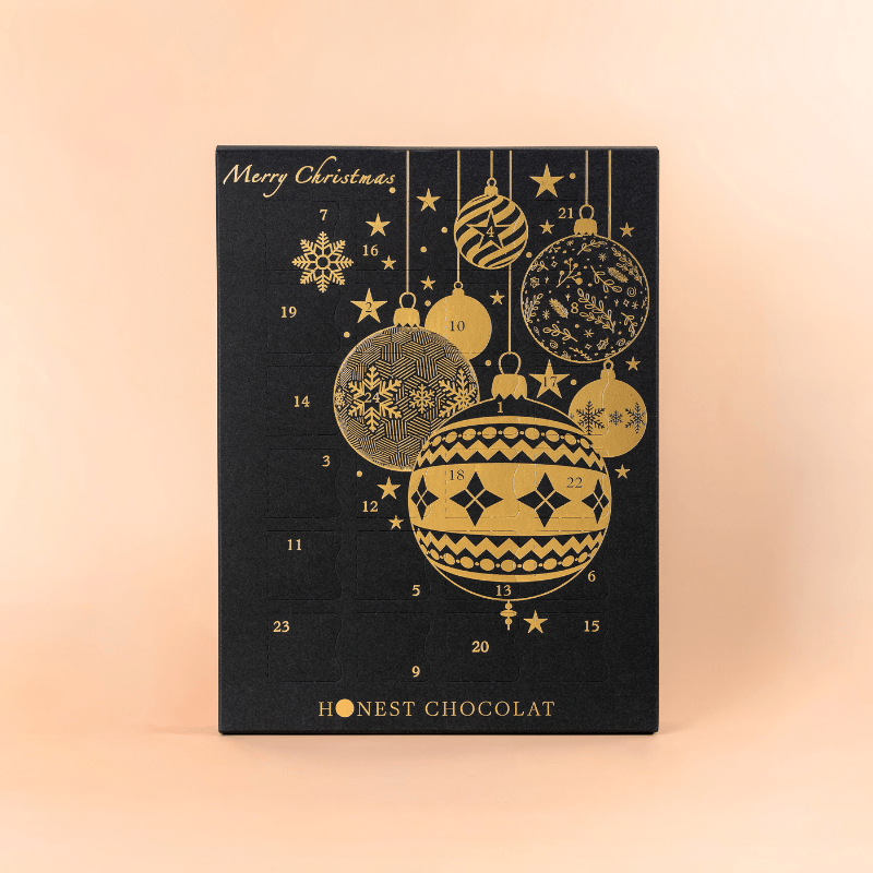 Luxury Christmas Chocolate Advent Calendar in black and gold by Honest Chocolat, featuring 24 handcrafted artisan chocolates made in New Zealand.