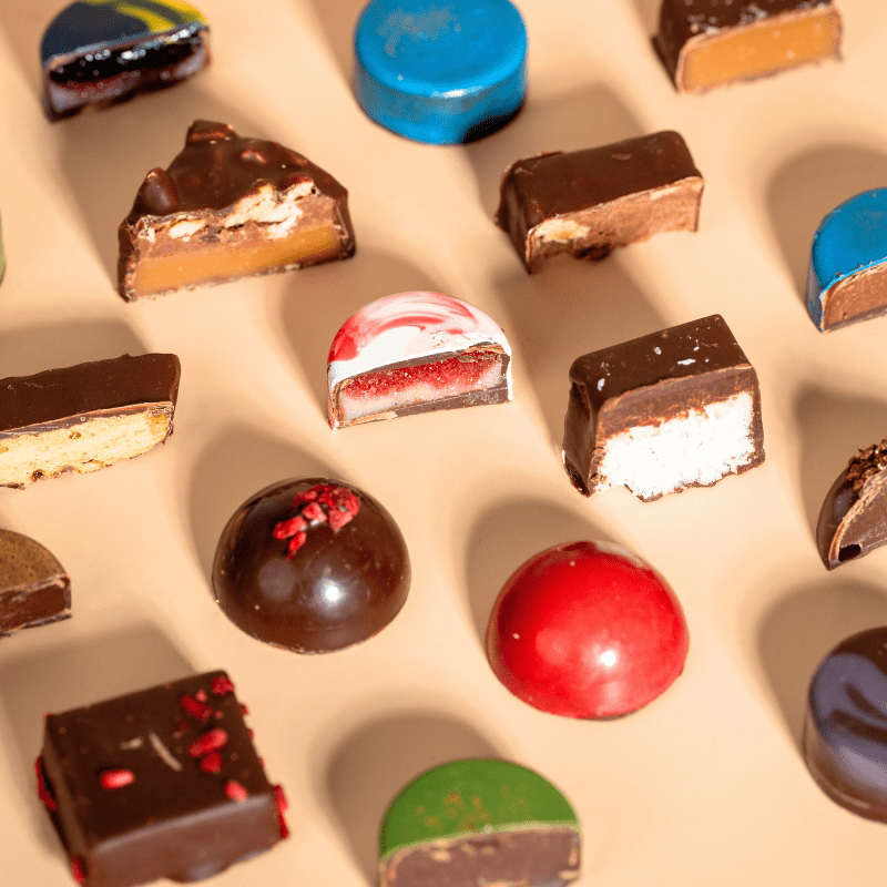 Broad close-up showing the detail and craftsmanship of Honest Chocolat’s luxury Christmas Advent Calendar filled with 24 handmade chocolates.