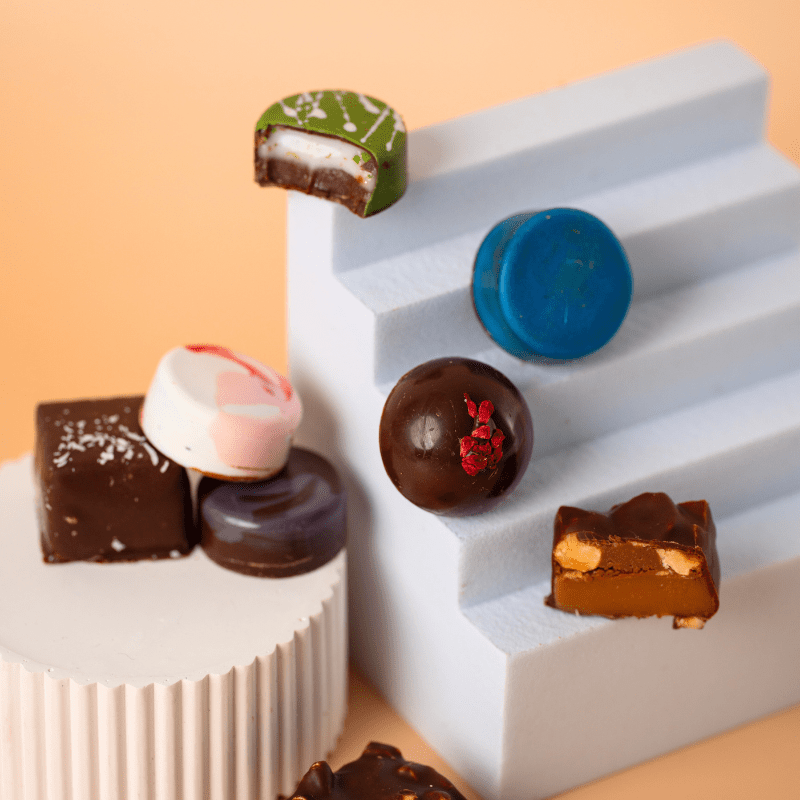 Lifestyle photo of Honest Chocolat’s luxury Christmas Chocolate Advent Calendar, artisan New Zealand-made gift with 24 handcrafted chocolates.